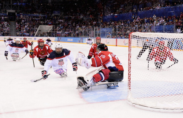 Josh Sweeney blasts the puck into the roof of the net in what proved the Paralympic gold medal winning strike ©Getty Images