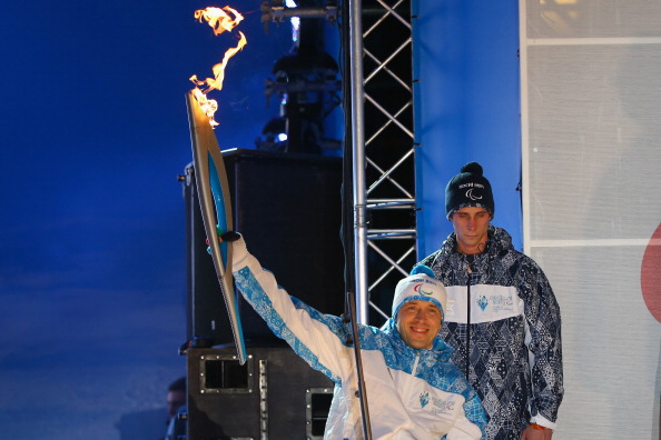 Mikhail Terentyev marks the arrival of the Paralympic Torch to Sochi ahead of the Winter Games ©Getty Images