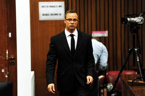 Oscar Pistorius hit Reeva Steenkamp in the hip with the first of four bullets that he fired ©AFP/Getty Images