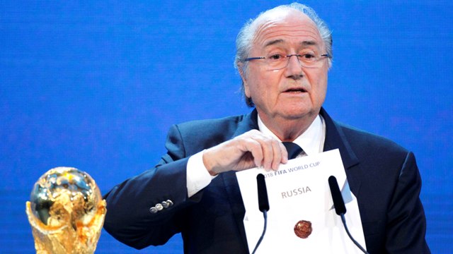 Sepp Blatter, seen here announcing that Russia had been chosen to host the 2018 FIFA World Cup, is among leading officials to have been quizzed over allegations of corruption ©Getty Images
