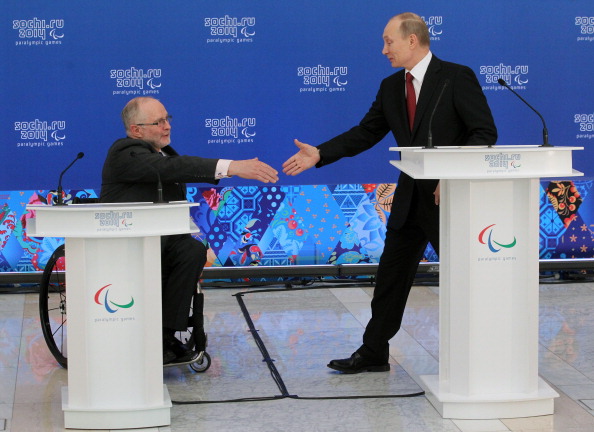 Sir Philip Craven pictured with Russian President Vladimir Putin during the Games ©Getty Images