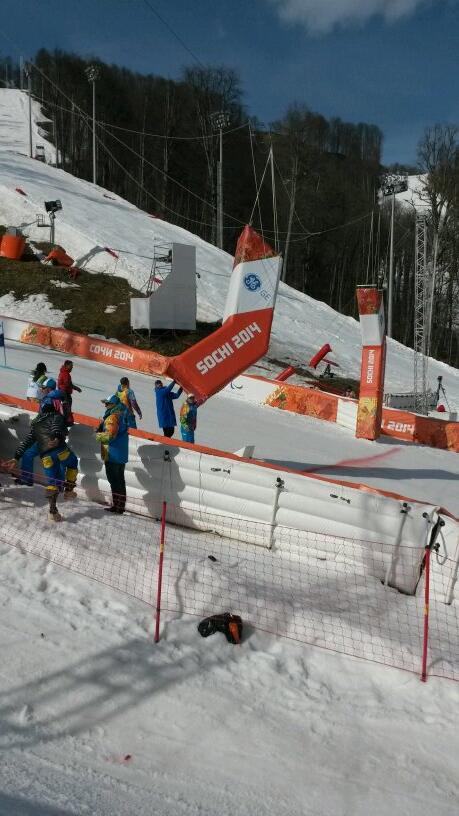 Russian officials needed to fix the finishing banner before the women's giant slalom sitting could resume its first run ©Twitter 