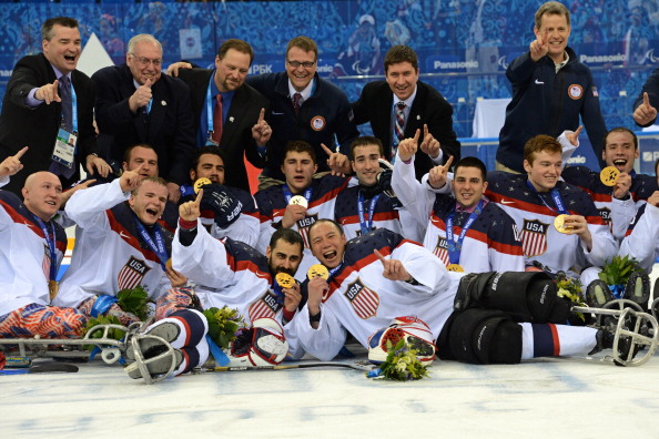 The US team celebrate with their ice sledge hockey gold medals ©AFP/Getty Images