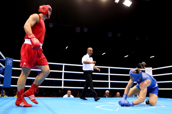 Zhang Zhilei in winning action midway through the London 2012 boxing competition ©Getty Images