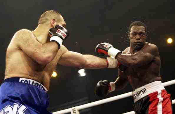 Clifford Etienne (right), pictured fighting Nicolai Valuev in a 2005 WBA Intercontinental bout, was convicted the following year of attempted murder ©Bongarts/Getty Images