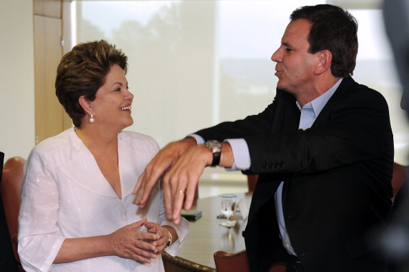 Rio Mayor Eduardo Paes, pictured with Brazilian President Dilma Rousseff, was among those at Copacabana Fort to unveil the infrastructure budget ©AFP/Getty Images