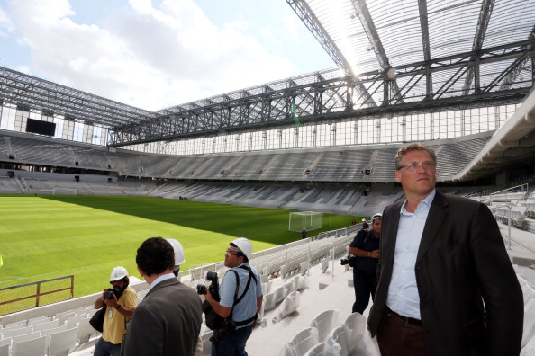 Jérôme Valcke inspects the Arena da Baixada in Curitiba, one of a number of stadiums causing FIFA a headache as the World Cup approaches ©AFP/Getty Images