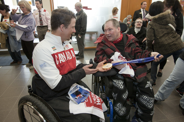 Members of the community were given the opportunity to visit their Paralympic heroes in their hometown at local CIBC branches ©Canadian Press Images/Jeff Bassett
