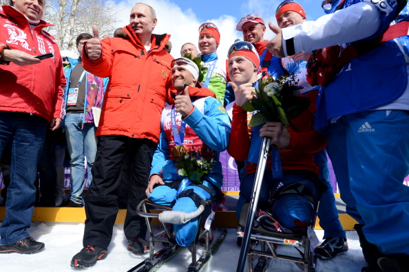 Russia's gold medal winning team pictured with President Vladimir Putin following their victory ©AFP/Getty Images