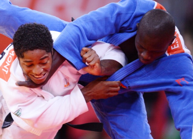 At London 2012 Nartey (blue) became the first judo athlete from Ghana to appear at an Olympic Games ©AFP/Getty Images