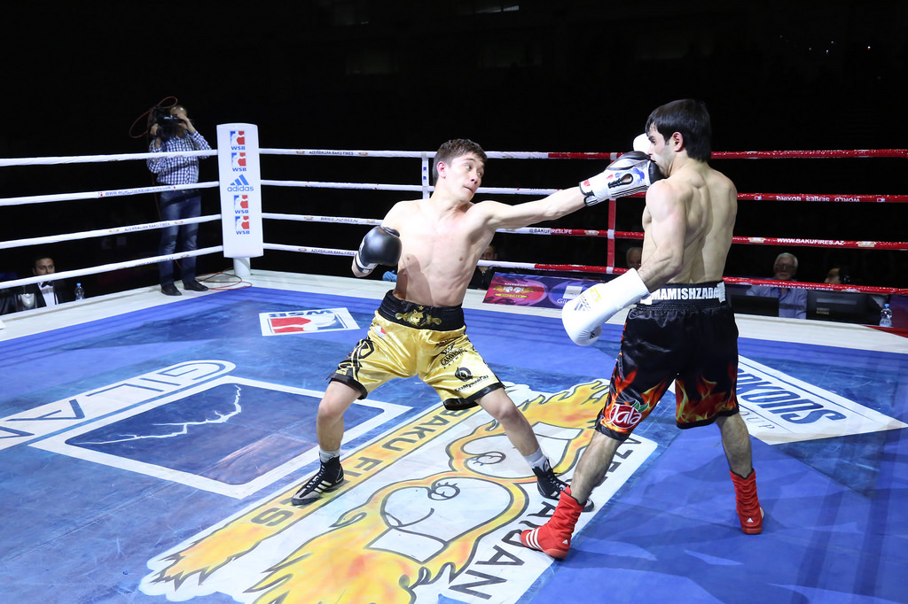 Elvin Mamishzada got the contest of to the best possible start for the home side as he beat Ilyas Suleimenov ©AIBA