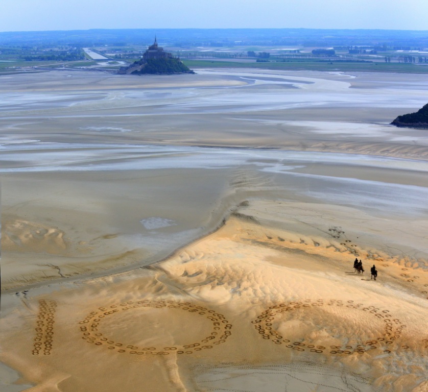 Giant 2.3m by 2.5m horse hoof prints created in the Bay of Mont-Saint-Michel mark 100 days to the start of the FEI World Equestrian Games 2014 in Normandy ©FEI