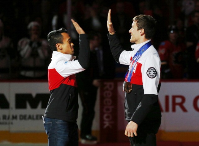 Gilmore Junio (left) allowed good friend Denny Morrison  the chance to skate for Olympic silver at Sochi 2014 ©Getty Images 