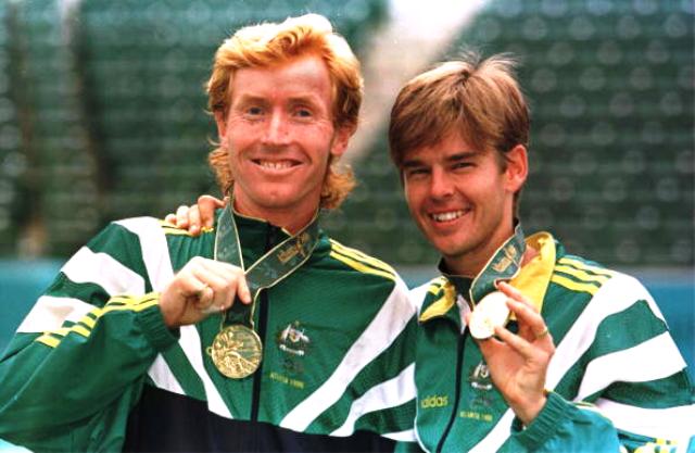 Mark Woodforde (left) and Todd Woodbridge show off their Olympic gold medals after winning in Atlanta in 1996 ©Getty Images 