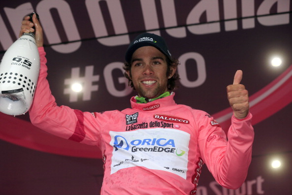Michael Matthews celebrates his overall leader pink jersey on the podium after winning the sixth stage of the Giro d'Italia ©AFP/Getty Images