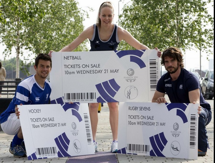 Scotland rugby sevens captain Colin Gregor, Scottish Thistles netball captain Lesley MacDonald and Scotland hockey star William Marshall unveil the first phase of delayed ticket sales ©Glasgow 2014