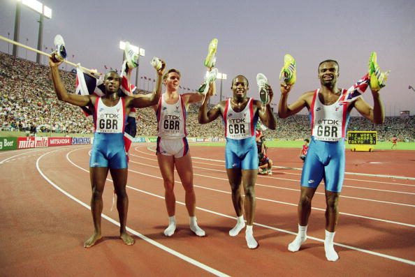 Kriss Akabusi (right) pictured with the British colleagues Derek Redmond (left), Roger Black (second left) and John Regis, who surprised favourites US to win the 1991 4x400m world title ©Getty Images