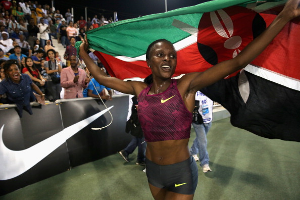 Hellen Obiri salutes her outstanding 3000m victory at the 2014 IAAF Diamond League meeting in Doha ©Getty Images