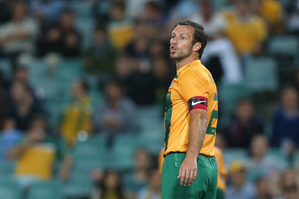 The bad news for Australia's 36-year-old former captain Lucas Neill was that he did not make the squad for the 2014 World Cup finals. The good news was he wouldn't have to ride around Brazil in a bus with an embarrassing slogan on its side ©Getty Images