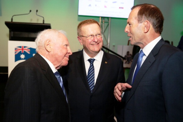 Author and historian Harry Gordon (left) was joined at the book launch by AOC President John Coates (centre) and Australian Prime Minister Tony Abbott ©Getty Images 