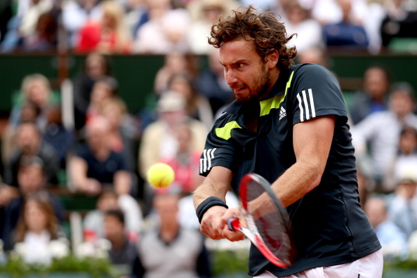 Ernests Gulbis battled through to a five set victory over Roger Federer to make his first French Open quarter-final since 2008 ©Getty Images
