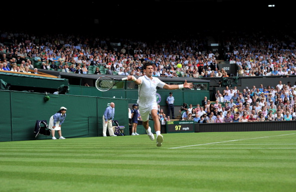 Novak Djokovic made it into the second round of the men's singles at Wimbledon with a straight-sets win ©AFP/Getty Images