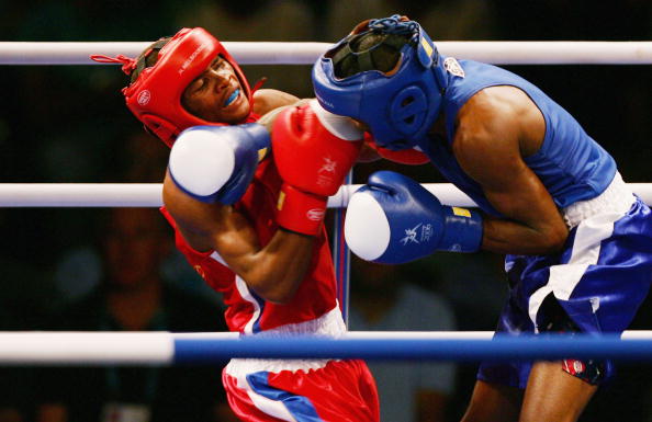 Light-flyweight boxer Simanga Shiba (left) won Swaziland's last Commonwealth Games medal, at Melbourne 2006 ©Getty Images