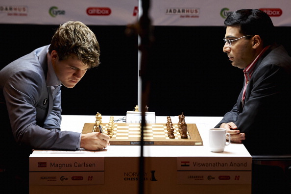 Viswanathan Anand will face Magnus Carlsen is their much anticipated rematch in Sochi ©AFP/Getty Images