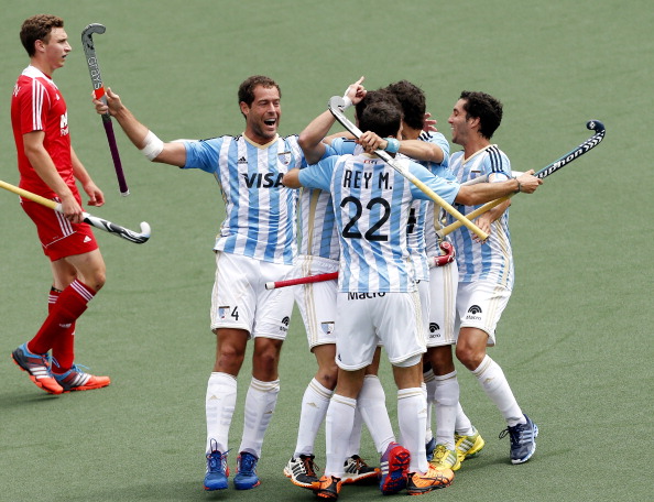 Argentina celebrate as Matias Paredes scores one of his two goals, which earned them a 2-0 win over England in the bronze medal match at the Hockey World Cup ©AFP/Getty Images