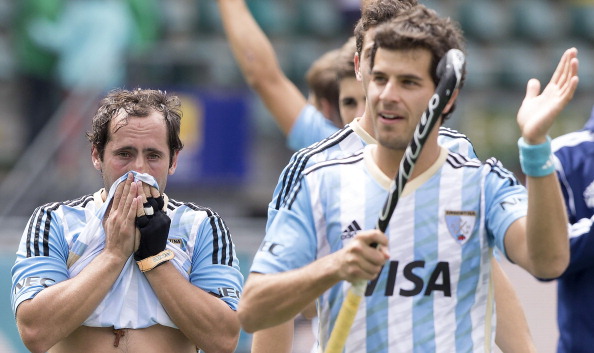 Argentina's men celebrate their 2-0 win over England in the bronze medal match at the Rabobank Hockey World Cup - but the result was subject to protest ©Getty Images