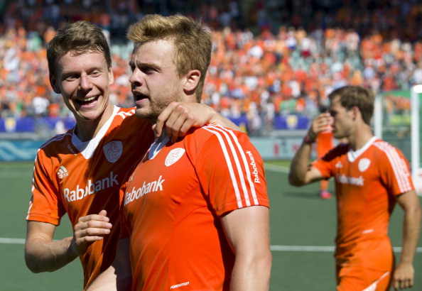 Jelle Galema (left) congratulates scorer Mink van der Weerden after The Netherlands beat England 1-0 to earn a place in Sunday's Hockey World Cup final, where they will meet Australia, thus mirroring tomorrow's women's final between the two countries ©AFP/Getty Images