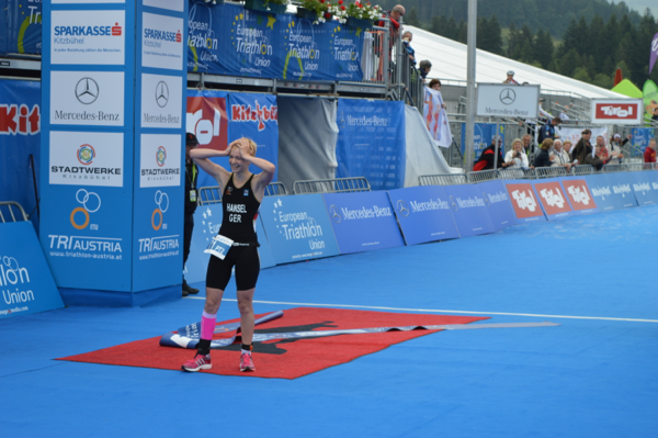 Germany's Nora Hansel reacts with suprise at realising she has won the PT2 event at the European Triathlon Championships in Kitzbuhel ©ETU