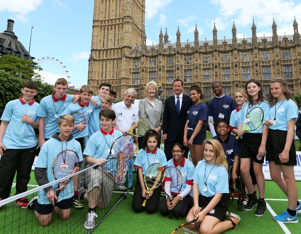 David Cameron meets pupils taking part in the schools tennis programme outside Westminster today ©LTA
