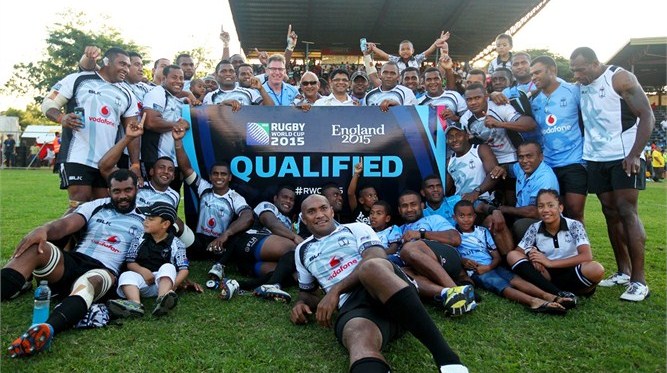 Fiji celebrate qualifyng for the 2015 Rugby World Cup in England and Wales after running up a century of points against Cook Islands ©IRB