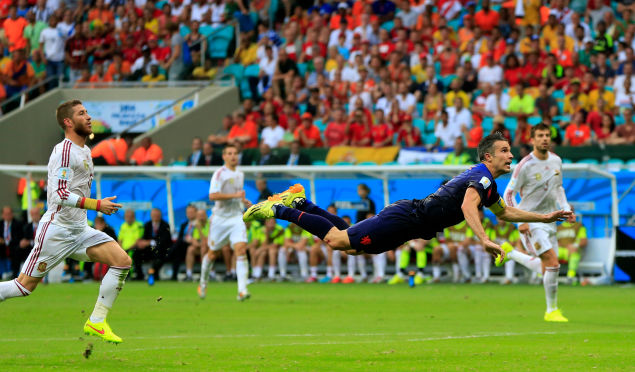 Robin van Persie's sensational header in Holland's 5-1 victory over defending champions Spain at this year's World Cup in Brazil was a reminder of the old times ©Getty Images