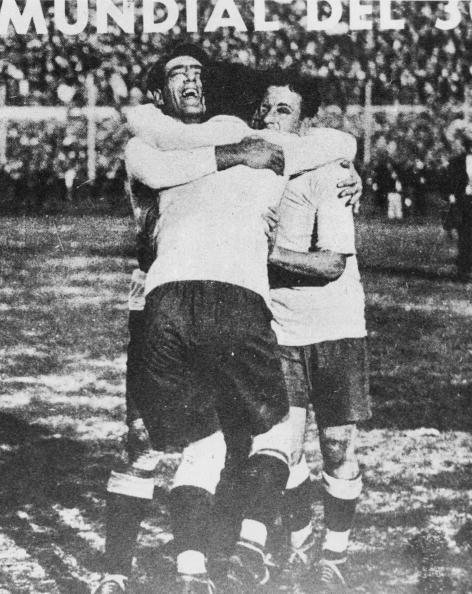 Uruguay's Lorenzo Fernandez (left), Pedro Cea (centre) and Hector Scarone celebrate beating Argentina 4-2 on the home soil of Montivideo in the first ever World Cup final in 1930 - a match that was put in jeopardy by a dispute between the teams over the match ball ©Hulton Archive/Getty Images