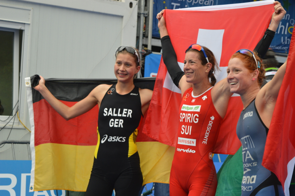 Switzerland's Nicola Spirig (centre) celebrates her fourth European triathlon title alongside silver medallist Sophia Saller of Germany (left) and bronze medallist Annamaria Mazzetti of Italy ©European Triathlon Union