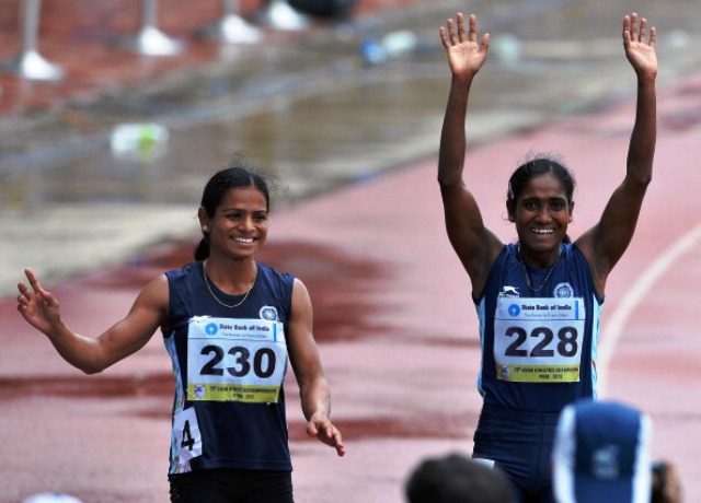Dutee Chand (left) won 200m bronze at last year's Asian Athletics Championships in Pune ©AFP/Getty Images