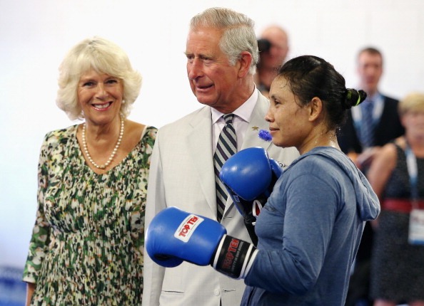Prince Charles and the Duchess of Cornwall getting some boxing tips