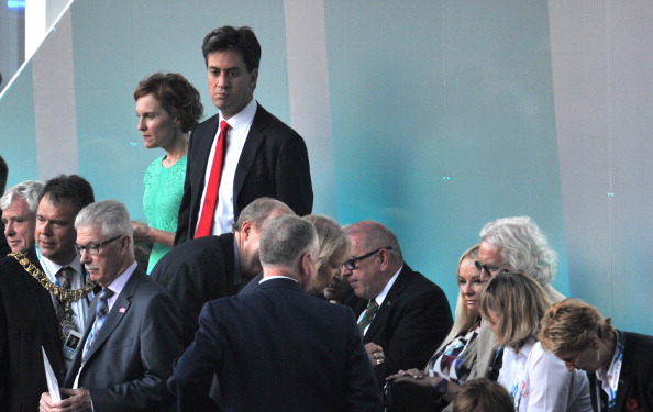 British Labour Party leader Ed Miliband almost smiling as he takes his seat ©Getty Images