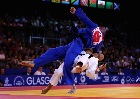 Danny Williams of England (blue) on his way to winning gold in the men's under 73kg judo ©Getty Images