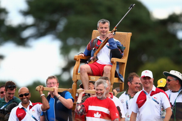 David Luckman of England was carried off the range in a Sedan chair after winning gold in the Queen's prize individual event on the final day of the shooting programme ©Getty Images