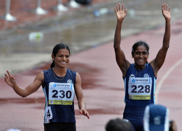 Dutee Chand (left) has become the latest victim of the IOC/IAAF gender policy ©AFP/Getty Images