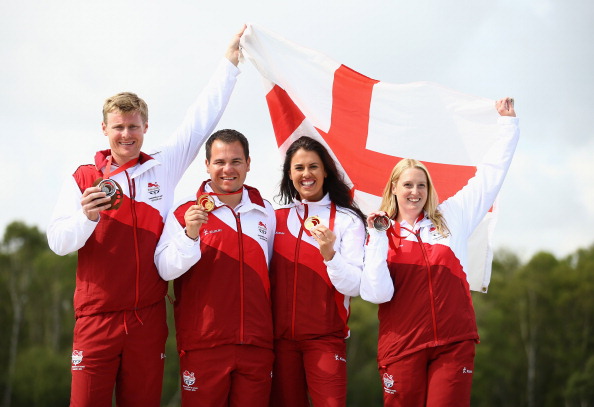 Four English shooting medallists display their metal after double trap domination ©Getty Images