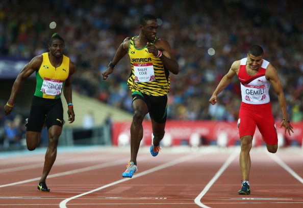 Kemar Bailey-Cole of Jamaica (centre) beat England's Adam Gemili (right) to men's 100m gold in a time of 10.00 ©Getty Images 