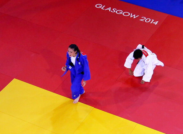 Kimberley Renicks of Scotland celebrated winning her country's first gold of the Games in the women's under 48kg judo, beating Shushila Likmabam of India ©Getty Images
