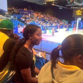 Members of the Jamaican swimming team watching the netball earlier ©Facebook