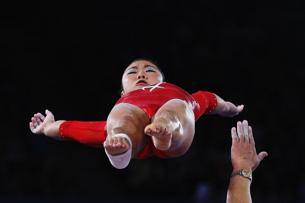 Rhythmic gymnast Heem Wei Lim of Singapore warming up ahead of the women's team final and individual qualification ©Getty Images 