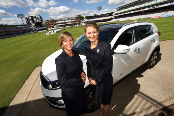 Head of women's cricket Clare Connor (left) and team captain Charlotte Edwards pose with a Kia Sportage at Lord's Cricket Ground ©Getty Images