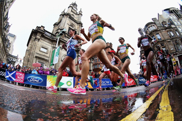 Jess Trengove of Australia and Susan Partridge of Scotland lead the field past St George's Tron Church during the women's marathon ©Getty Images